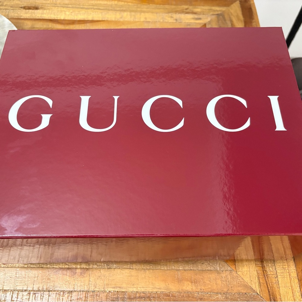 Elegant Red Gucci box. Perfect for storage or gifting.
